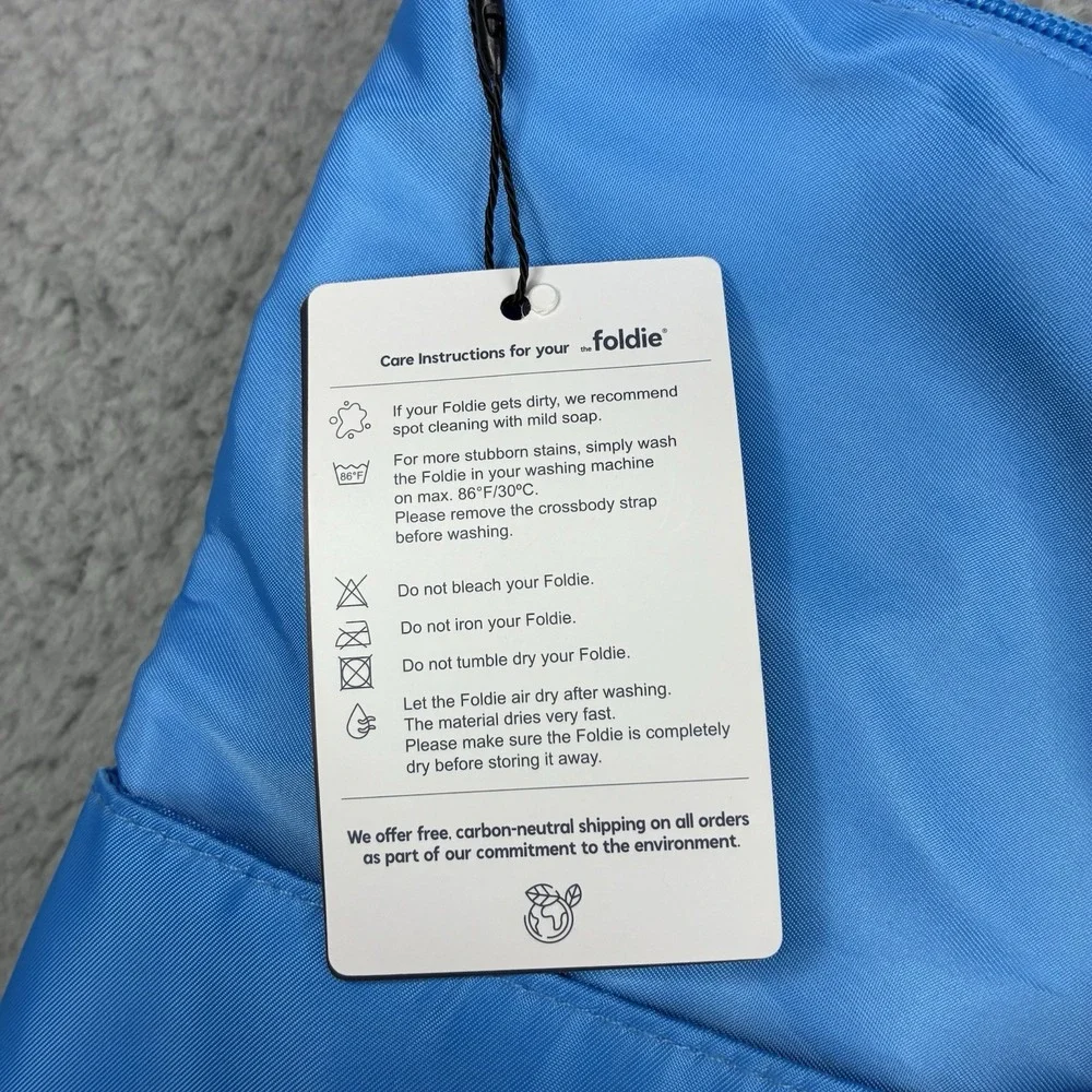 The Foldie 40L Travel Bag Carry On Expandable Azure Blue Weekender Tote NWT